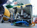 ROV with grab and recovery line